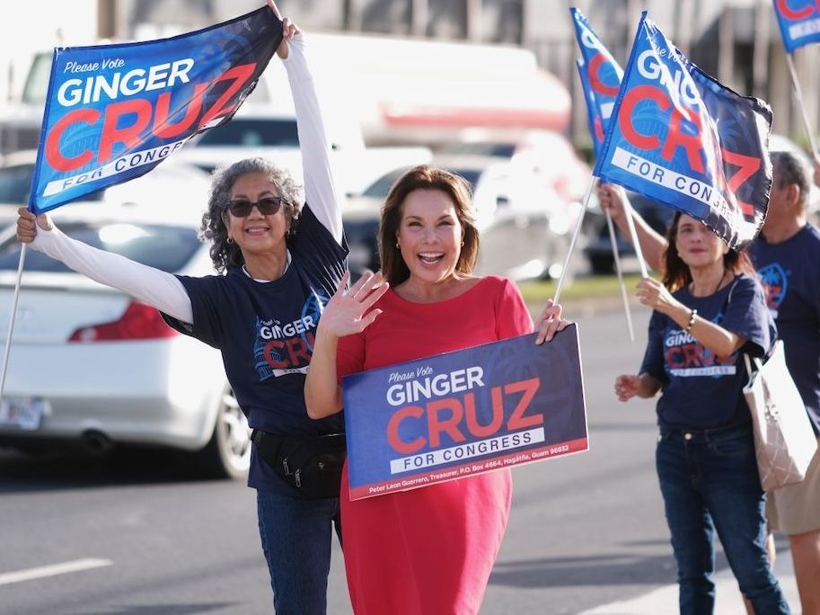 Ginger Cruz posing with current Guam governor Lou Leon Guerrero and lieutenant governor Josh Tenorio