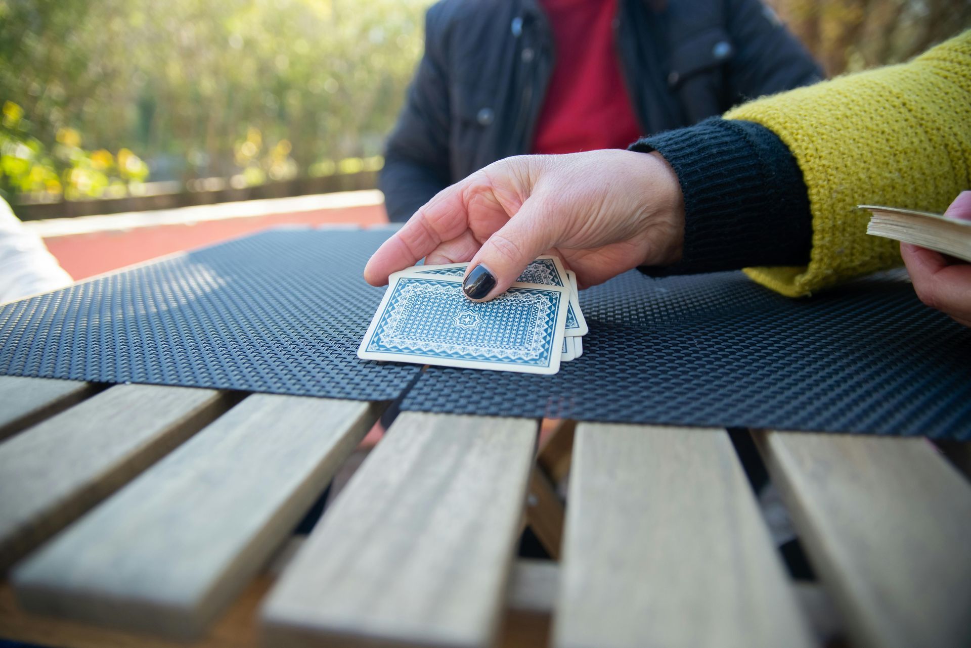 A man is cleaning the seats of a car.