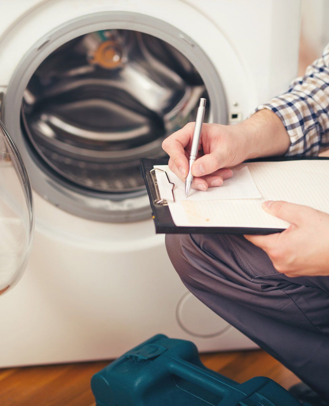 Checking The Washing Machine — Albion Park, NSW — Prime Appliance Service