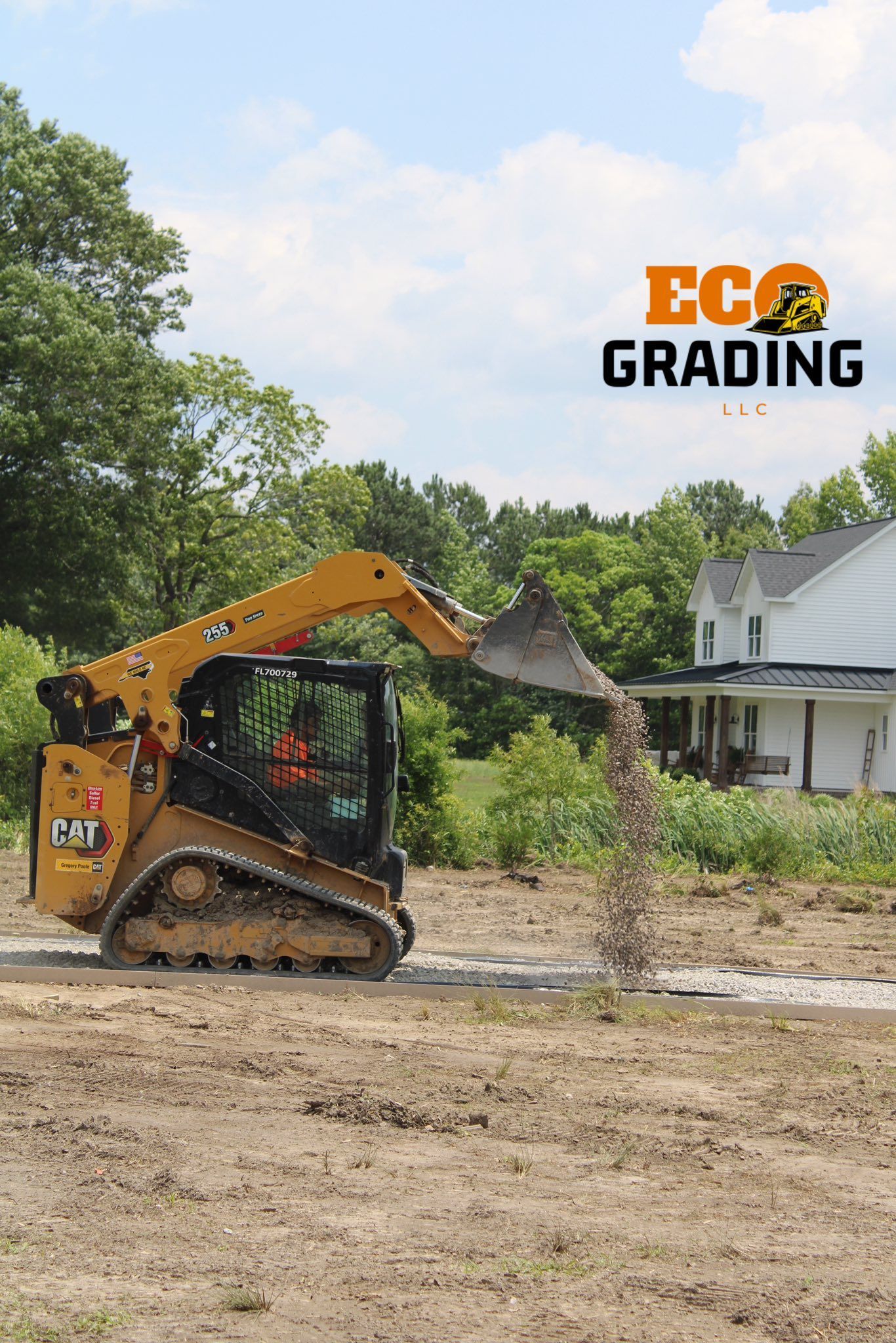 Yellow skid steer grading a gravel path next to a white house; Eco Grading logo in the corner.