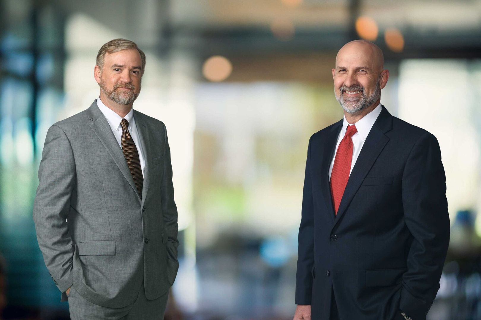 Personal injury attorneys Allen Ritchie and Jason Steele smiling.