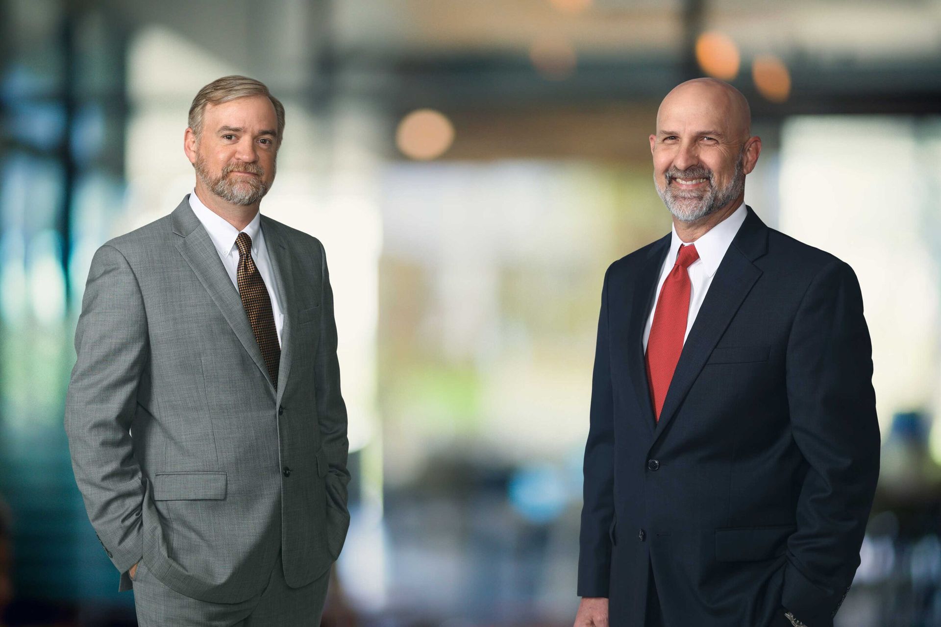 Personal injury attorneys Allen Ritchie and Jason Steele smiling.