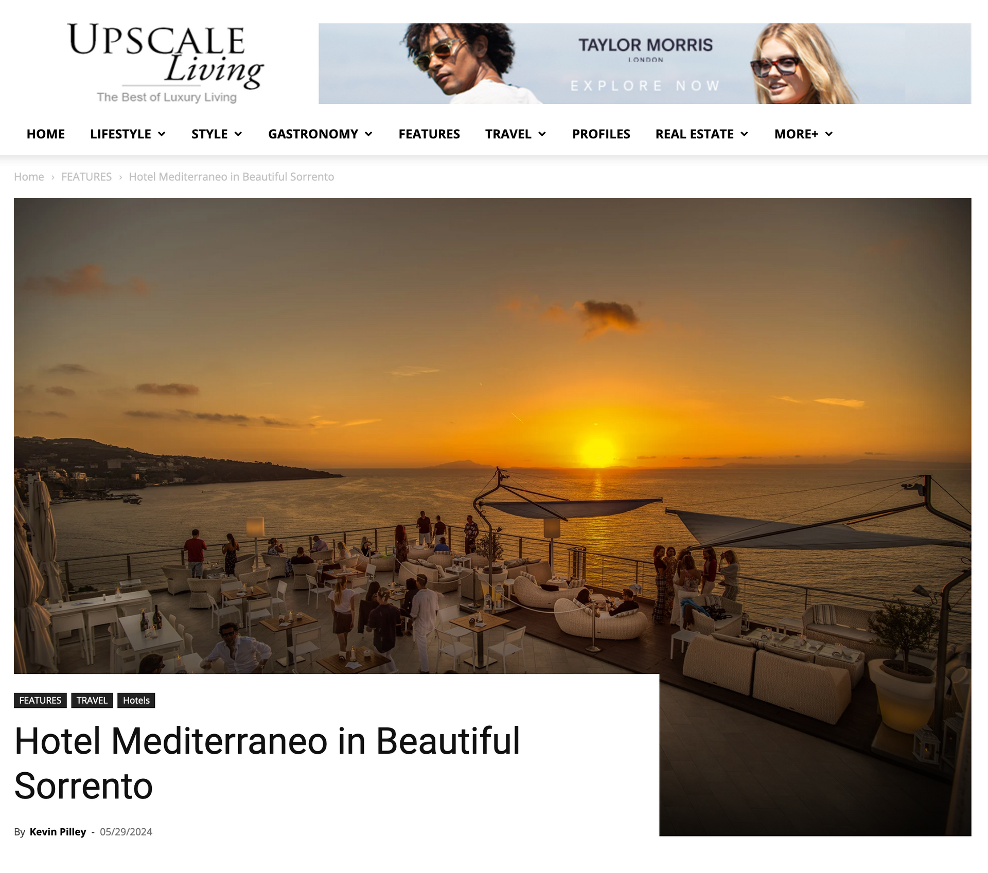 Sunset view of an outdoor terrace at Hotel Mediterraneo in Sorrento, featuring seating areas overlooking the sea.