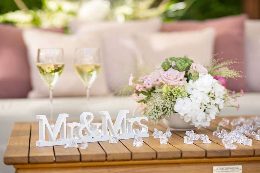 A wooden table with a white 