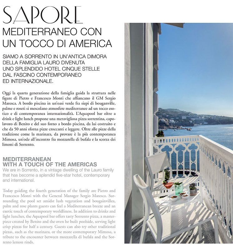 A balcony with a small white table and chairs overlooking the sea, next to text about a Sorrento hotel.