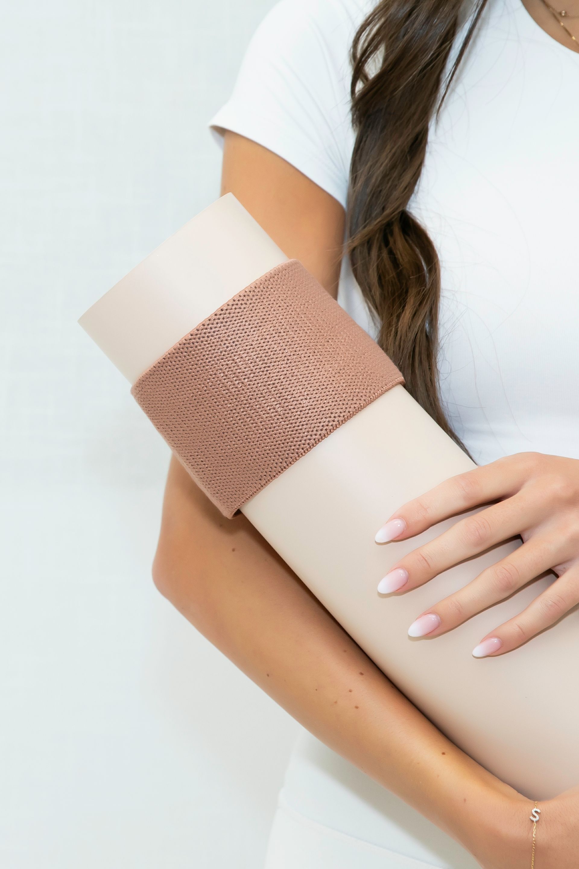 Sabrina holding a Reformer Pilates Exercise Foam Roller