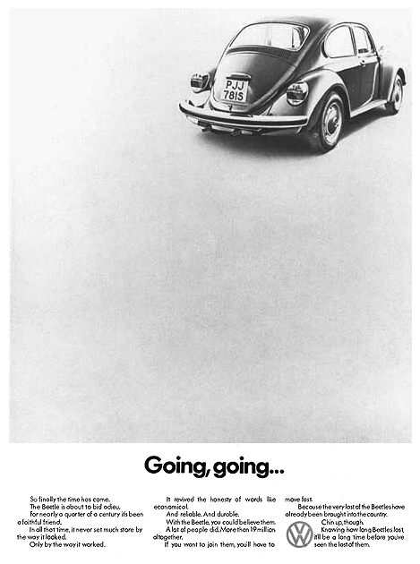 A black and white photo of a volkswagen beetle