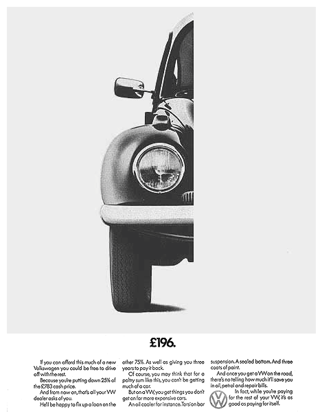 A black and white photo of a volkswagen beetle.