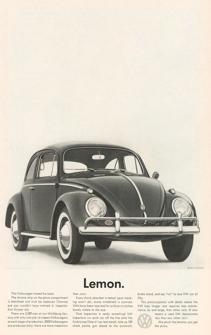 A black and white photo of a volkswagen beetle.