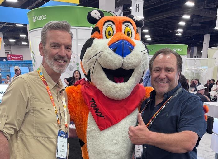 Paul Jackson and Cord Harper at the Las Vegas International Licensing Expo with Tony the TIger