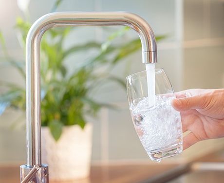 Filling A Glass With Water — North Logan UT — Hytek Water Conditioning