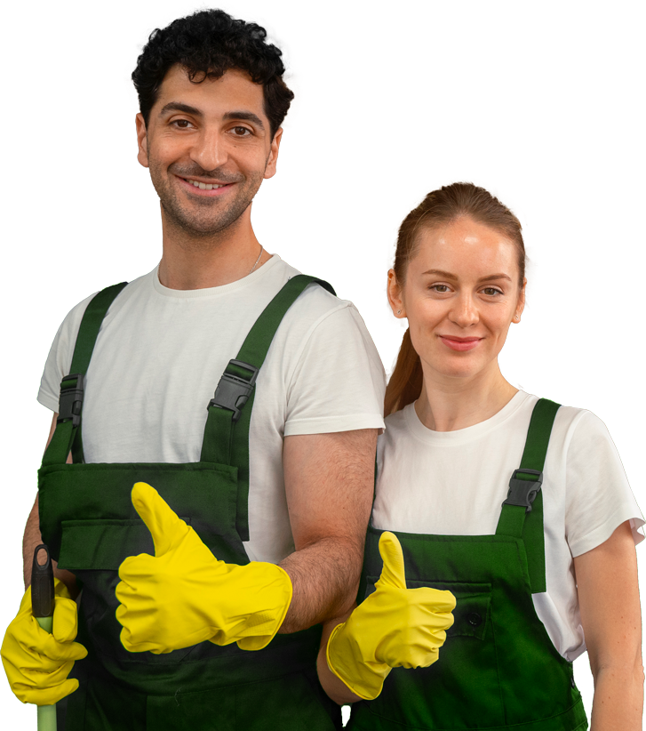 A man and a woman wearing green overalls and yellow gloves are giving a thumbs up