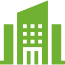 A green icon of a building with squares on it on a white background.