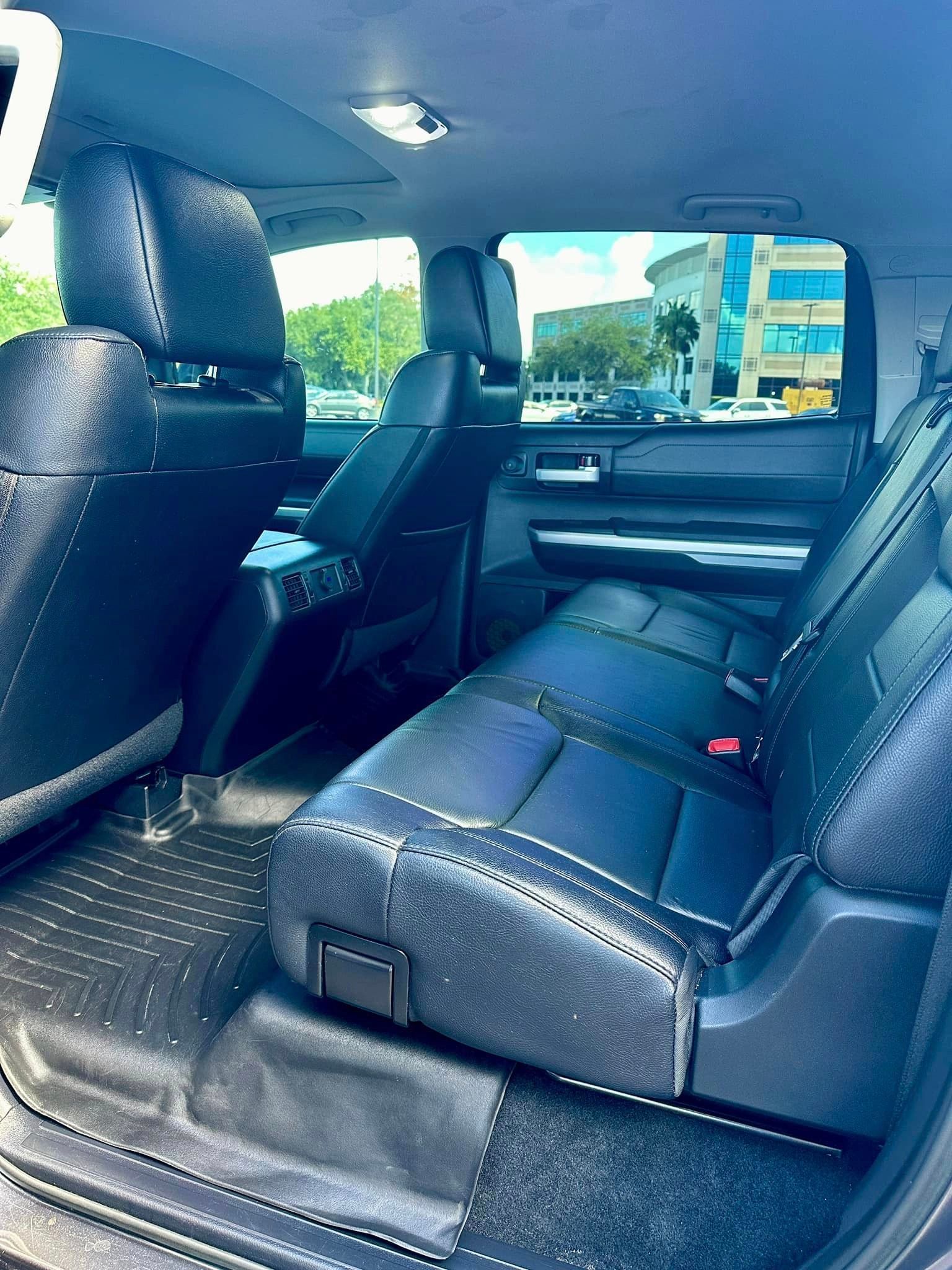 The back seat of a toyota tundra is shown.