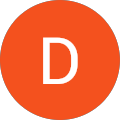 The letter d is in an orange circle on a white background.