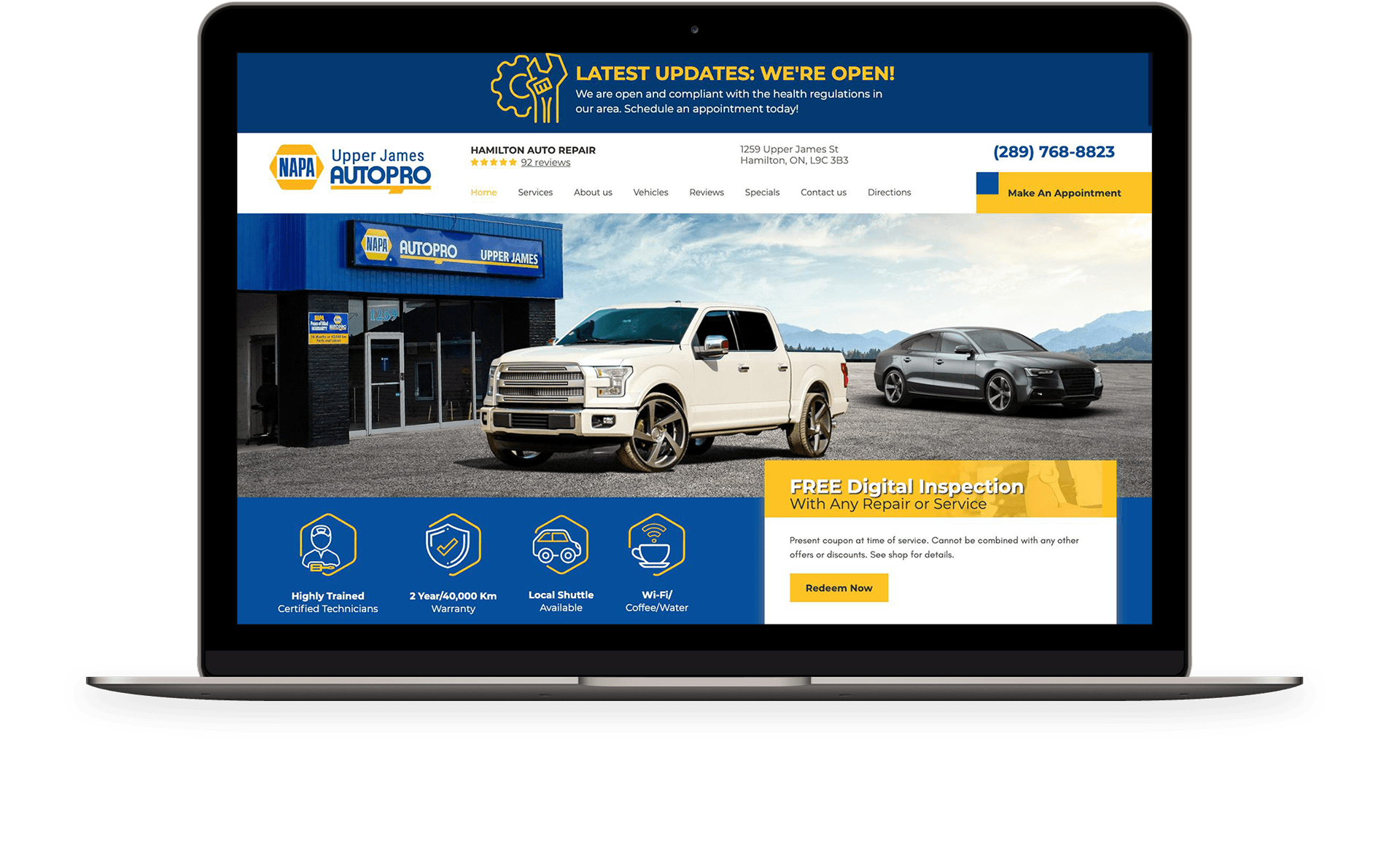 A laptop computer is open to a website for a car dealership.