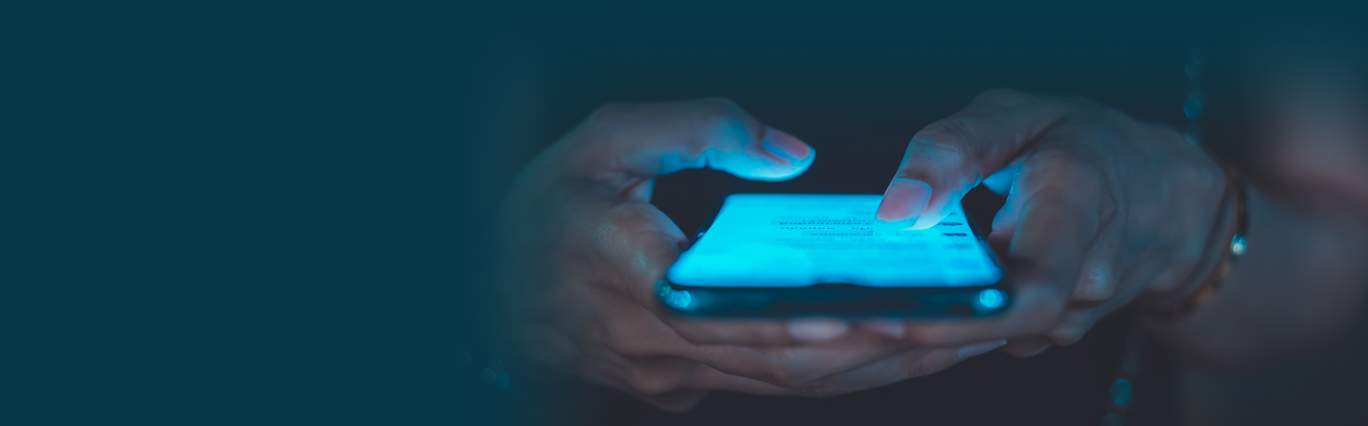 Up close to person scrolling through social media on phone | KUKUI