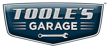 A logo for tools garage with a wrench on it