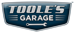 A logo for tools garage with a wrench on it
