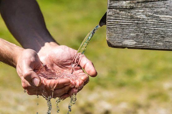 Clean Water — Hand Full of Clean Water in Climax, NC