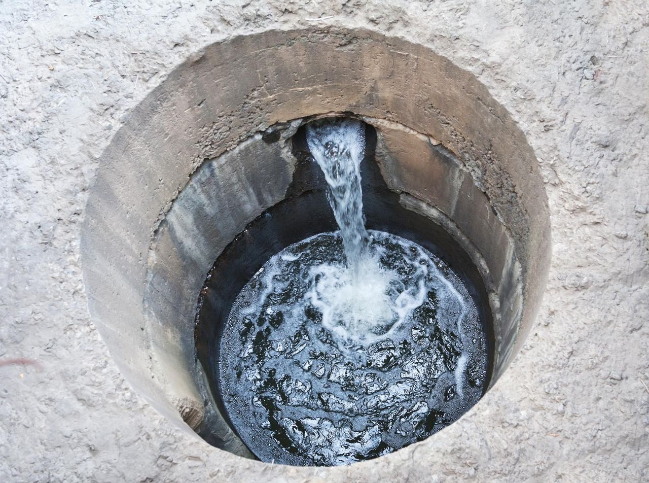 Water is coming out of a hole in the ground