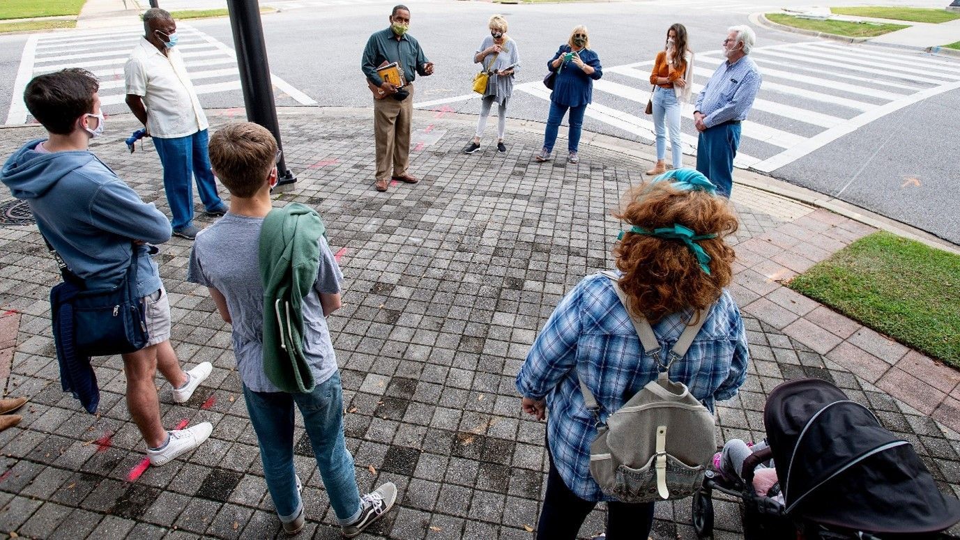An aerial view of a city surrounded by water and buildings.