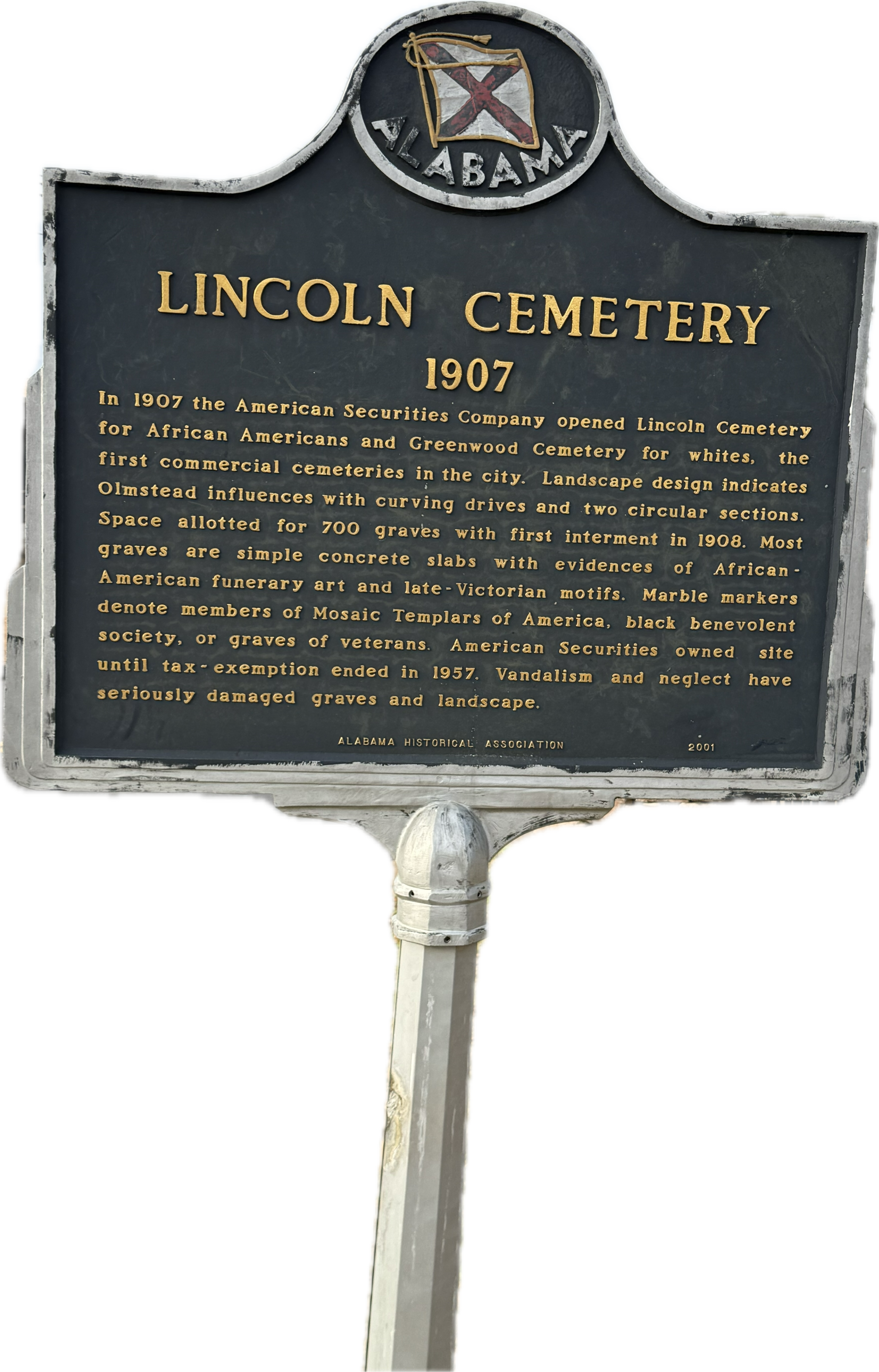 A cemetery with many graves and flags on them.