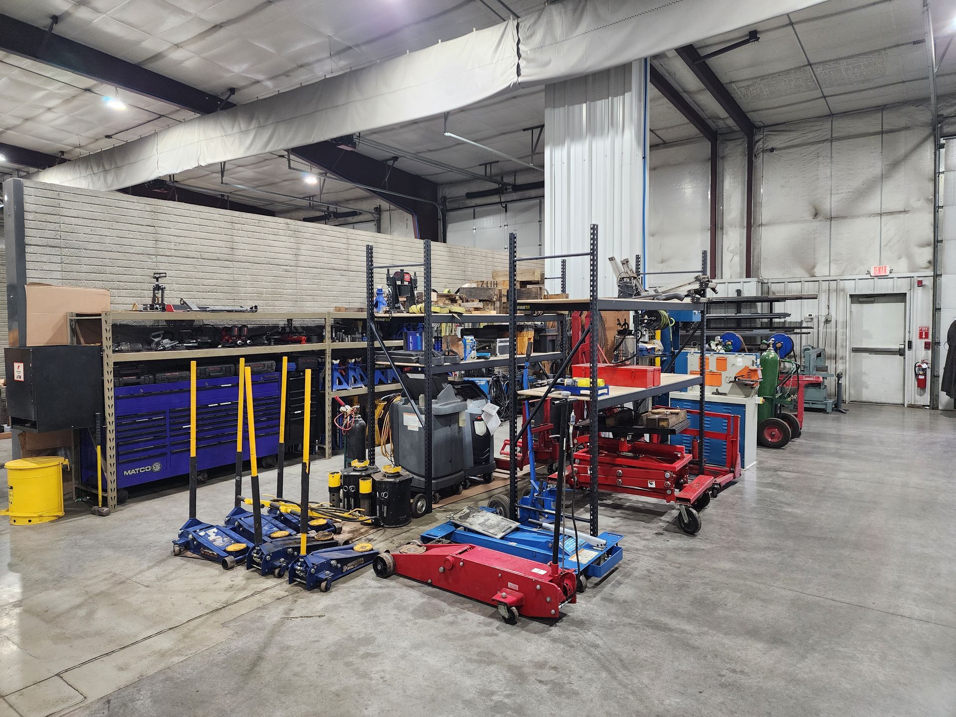 A large warehouse filled with lots of tools and equipment.