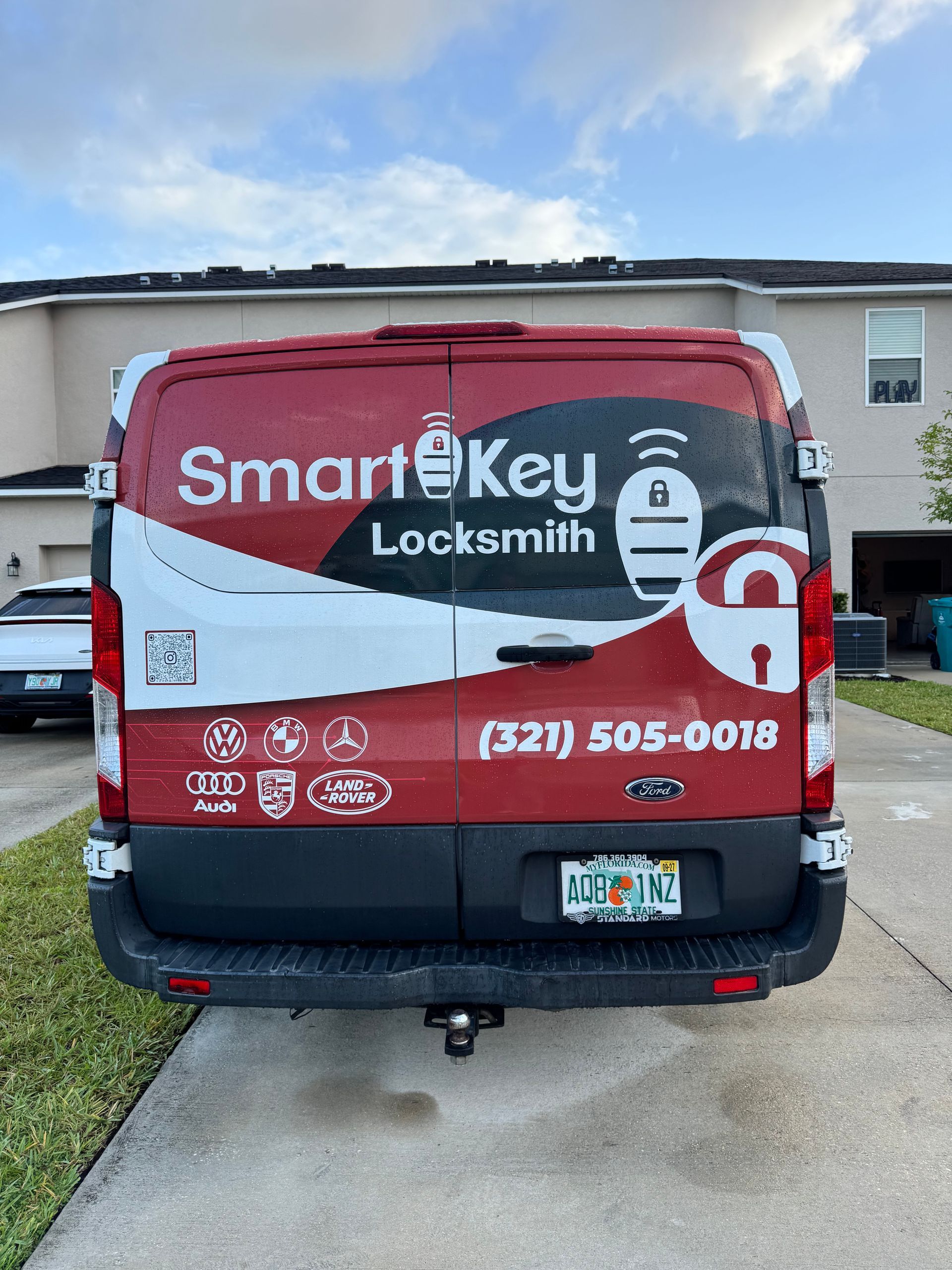 A Locksmith working on a door in a hotel room.