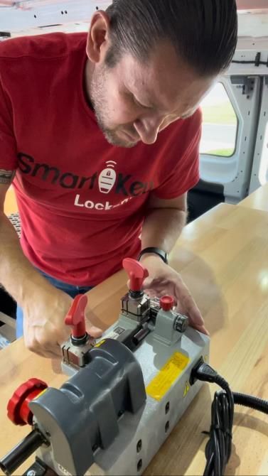 Male lockpicker fixing door handle at home.