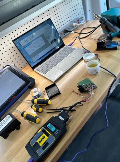 Woman at locksmith shop requesting a key duplication service