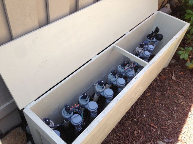 A box with a lot of bottles inside of it