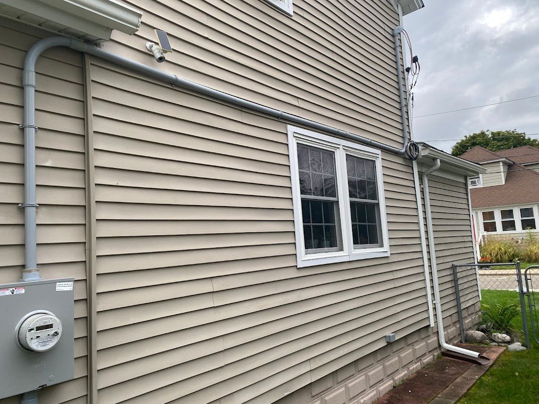 There is a meter on the side of the house.