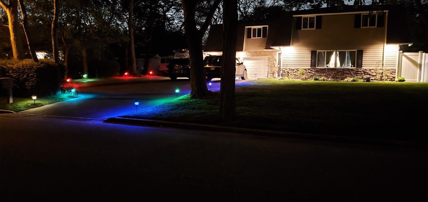A house with a lot of lights on it at night