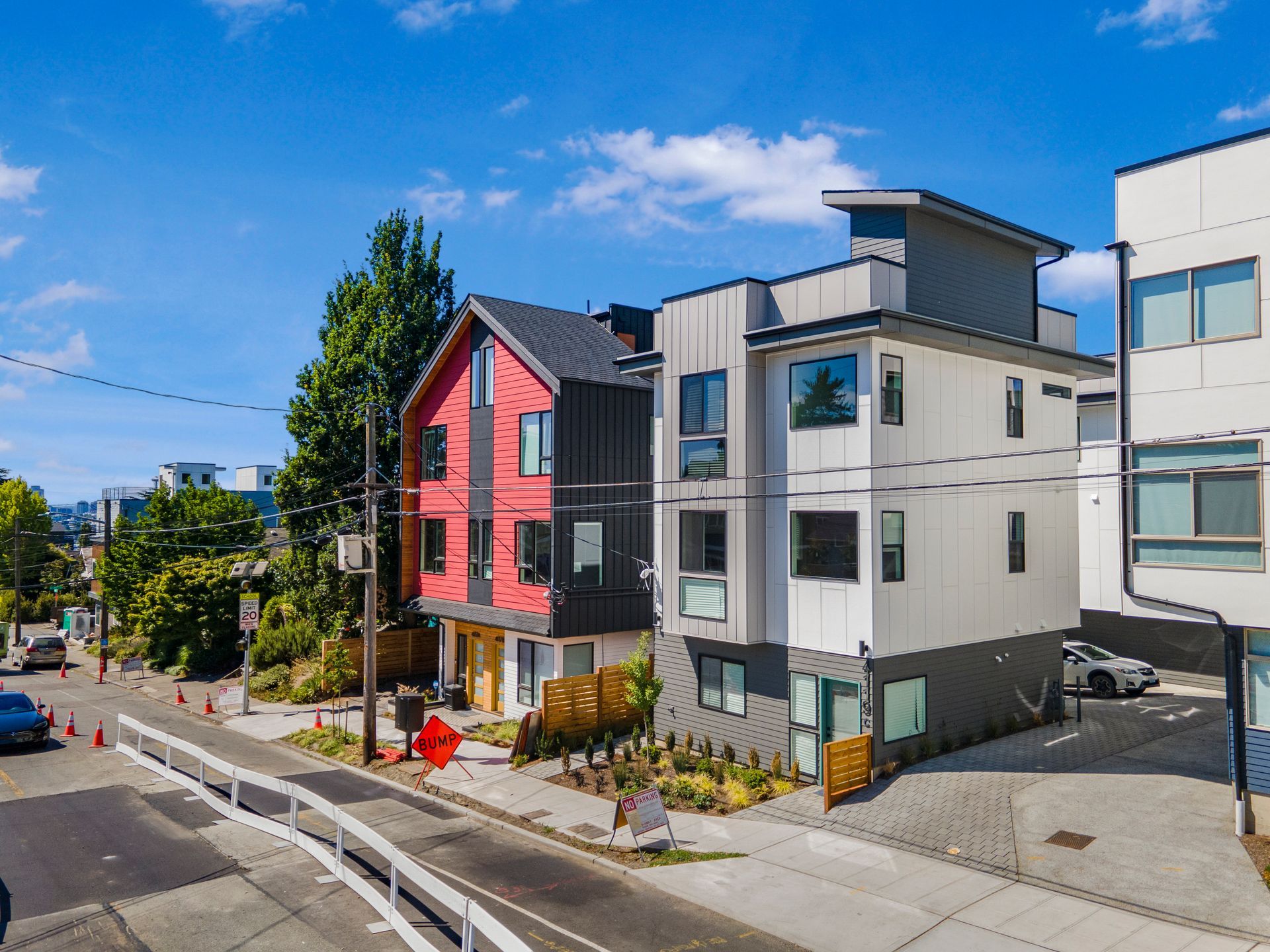 An aerial view of a row of houses on a sunny day