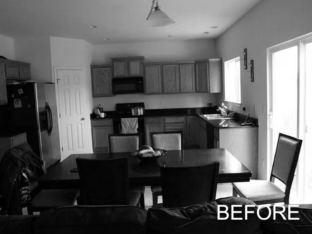 A before picture of a kitchen with a table and chairs