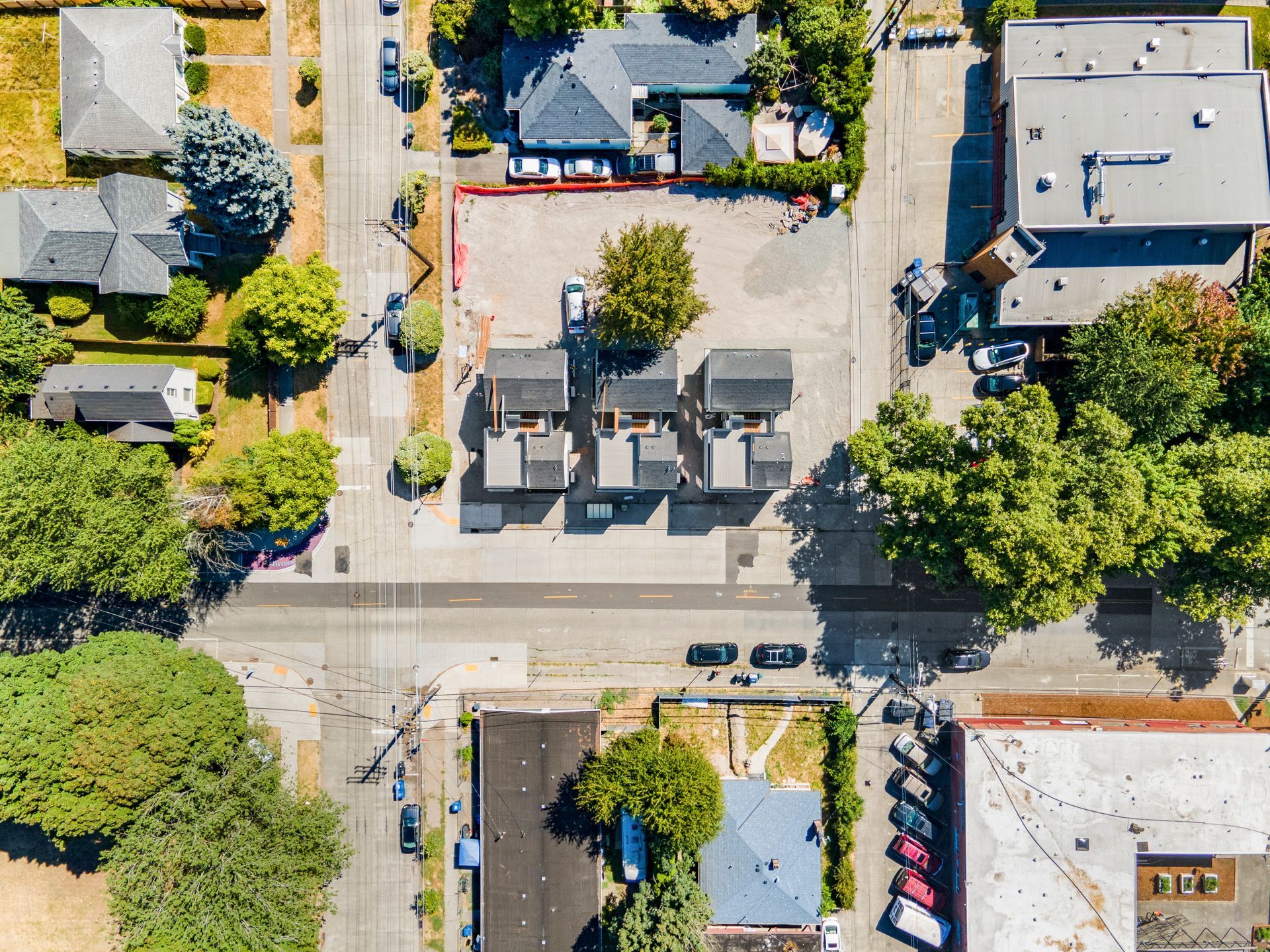 An aerial view of a residential area with lots of houses and trees.