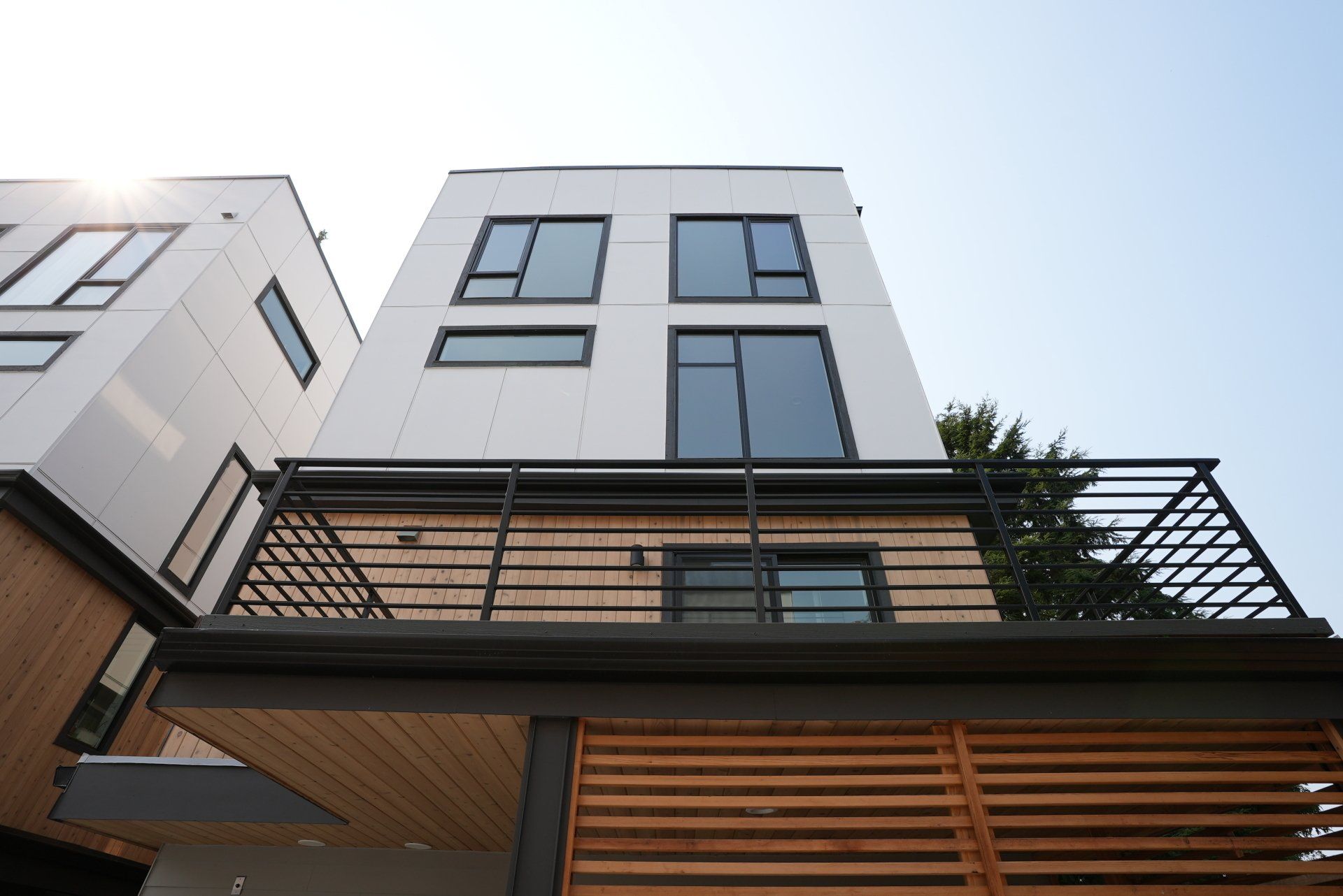 A building with a balcony and a lot of windows