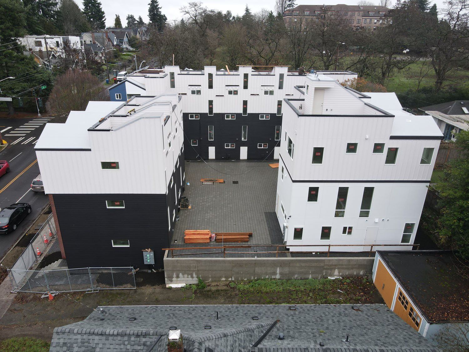 An aerial view of a building with a lot of windows