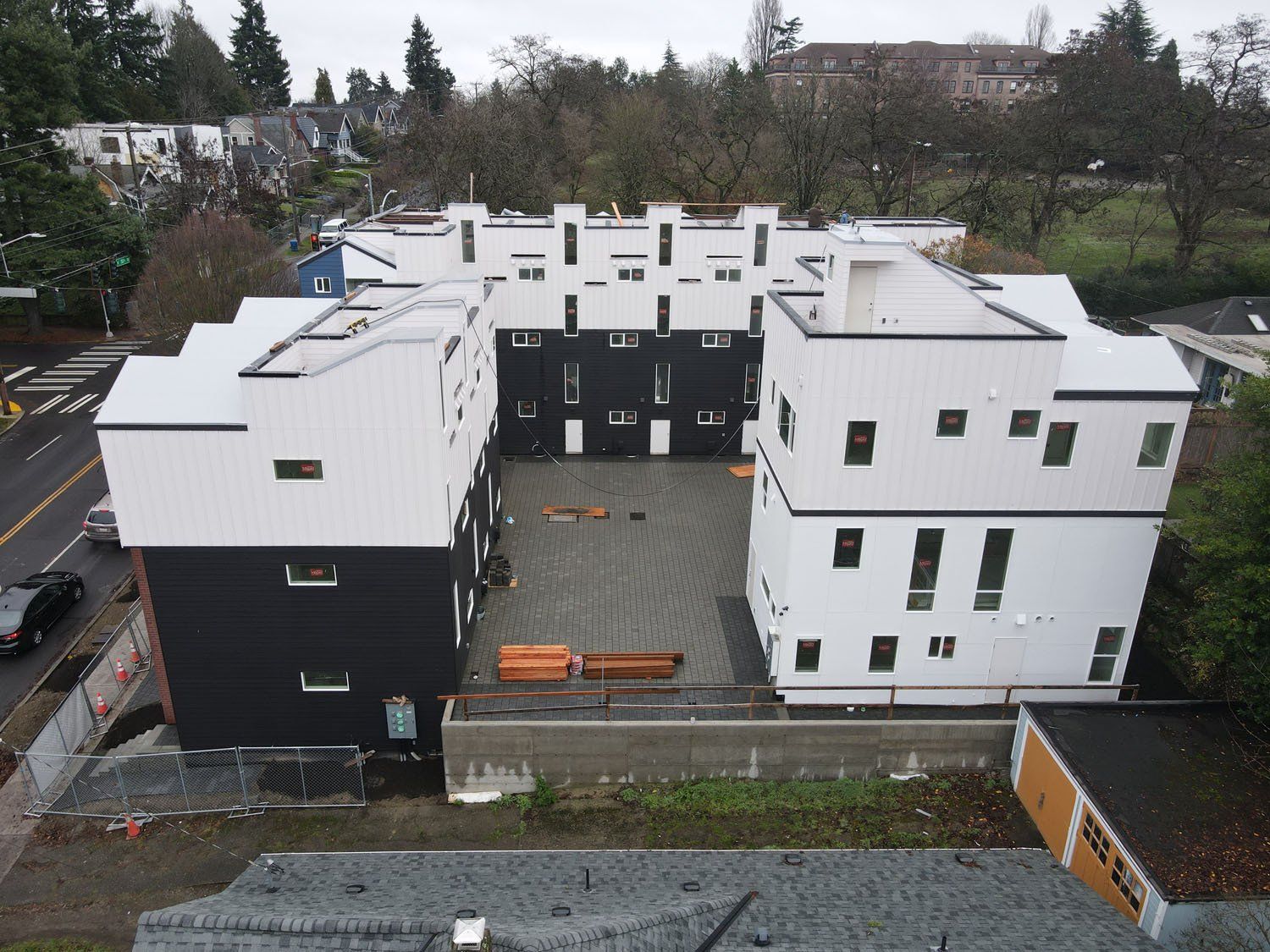 An aerial view of a building with a lot of windows