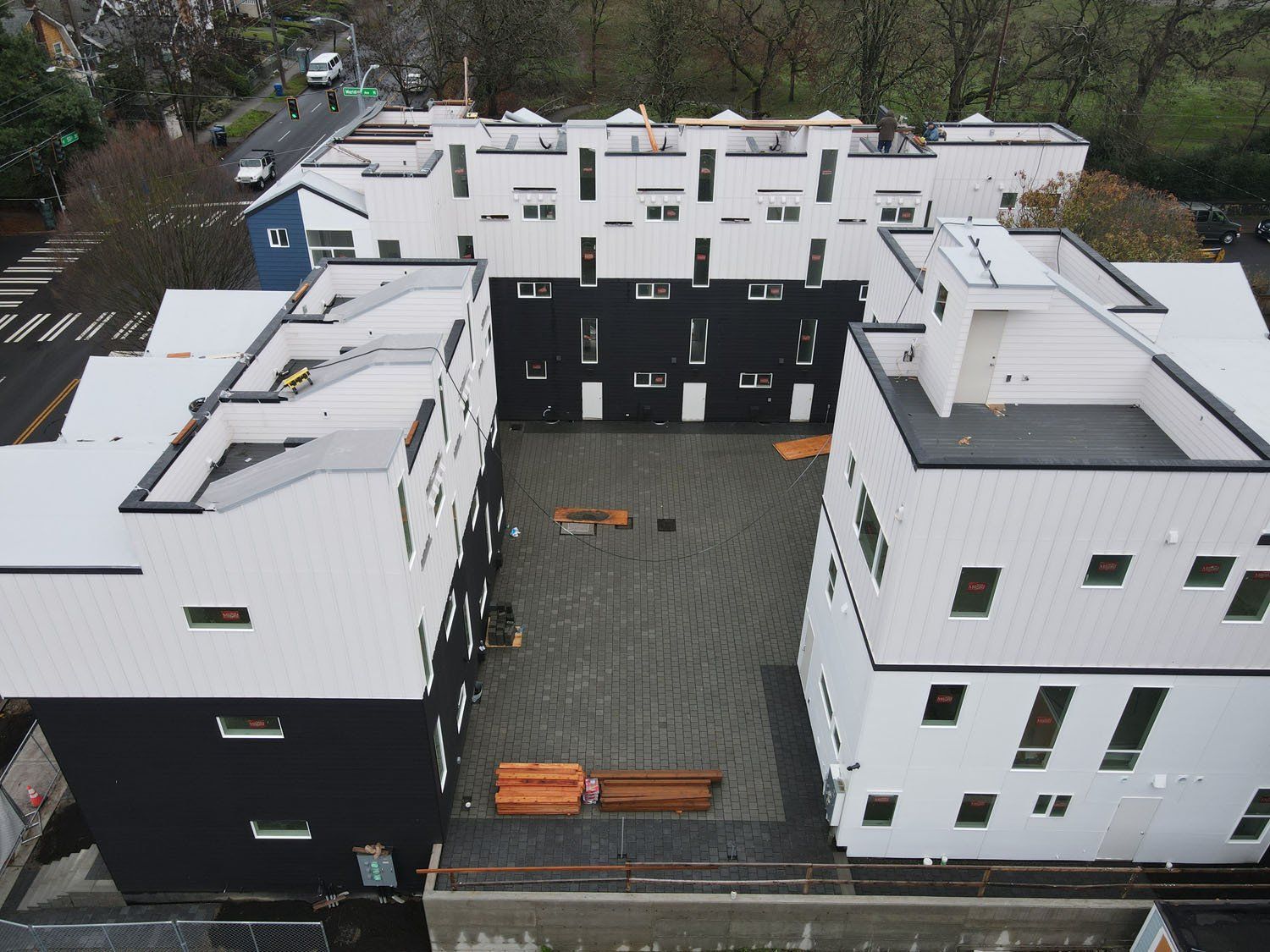 An aerial view of a building with a lot of windows