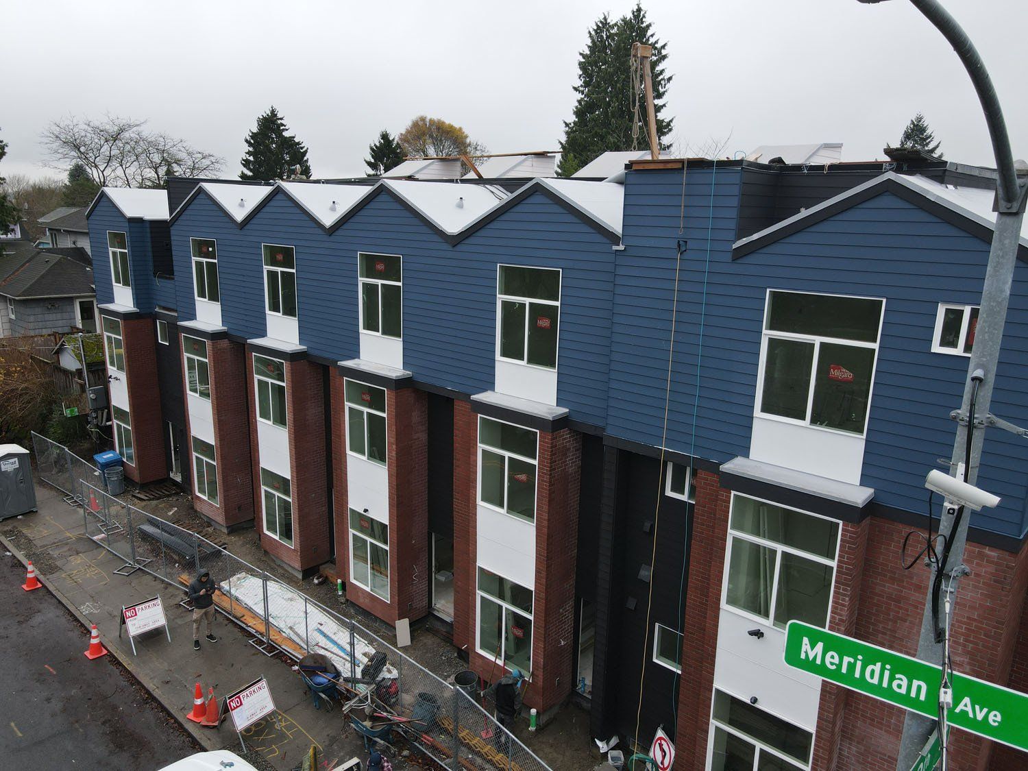 An aerial view of a row of apartment buildings on meridian ave