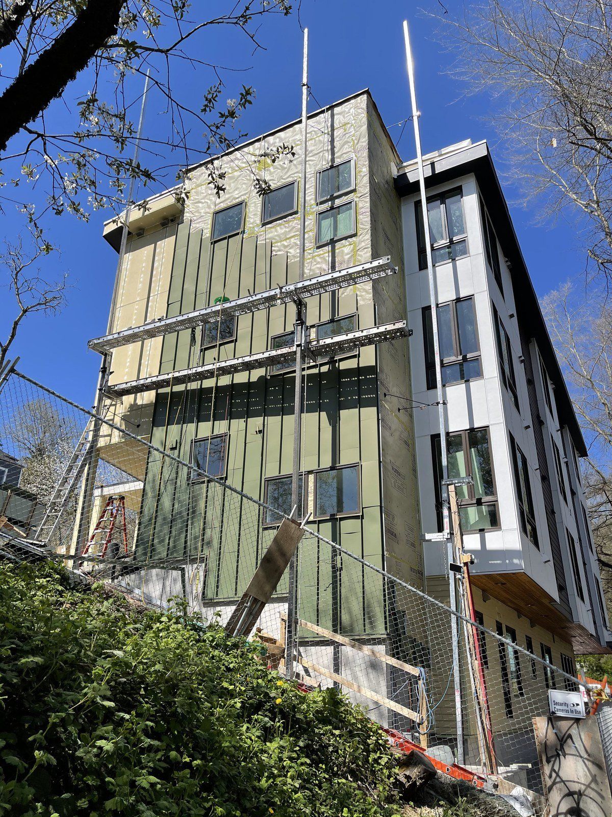 A large building under construction with scaffolding around it.