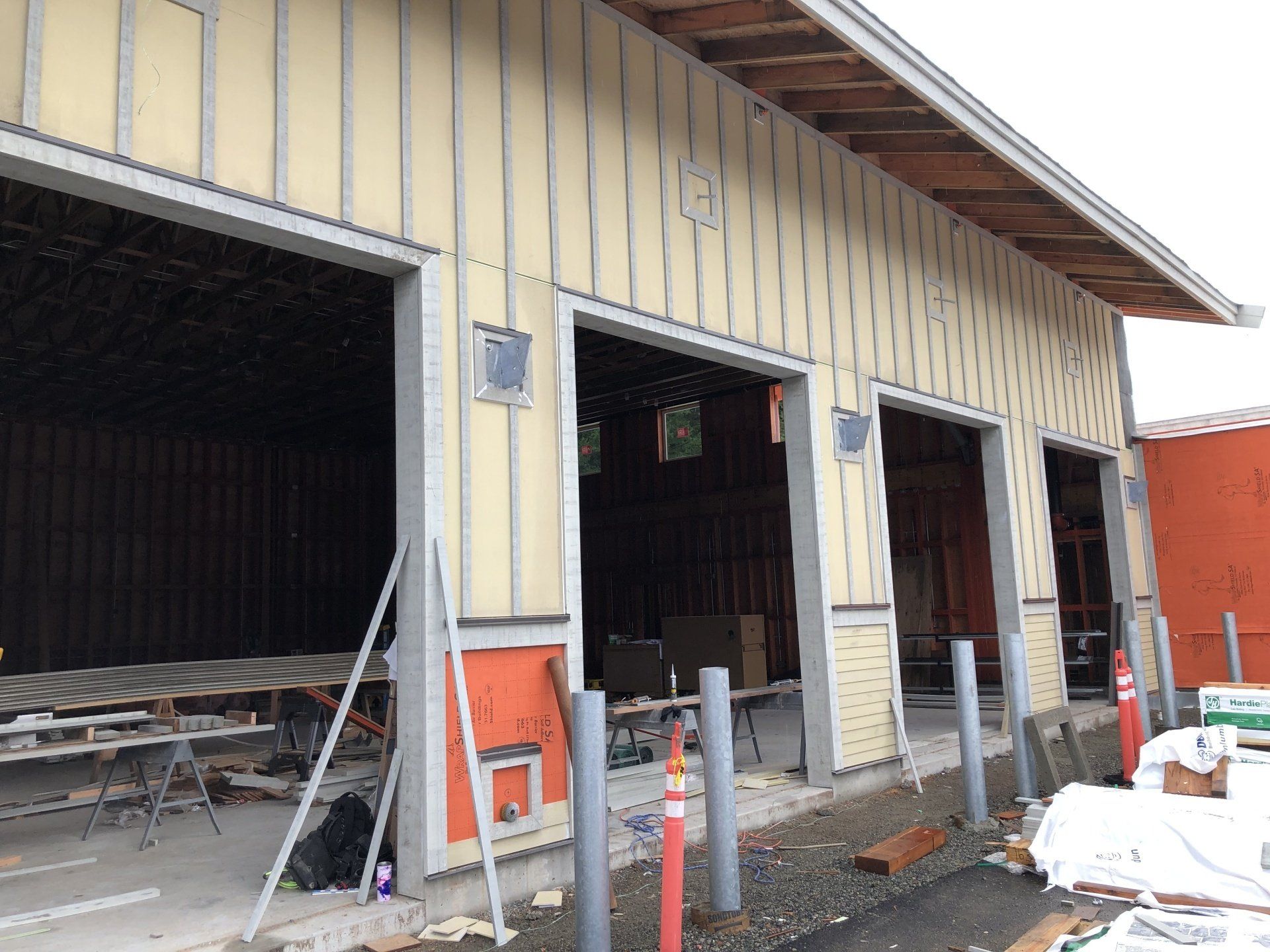 A building under construction with the doors open