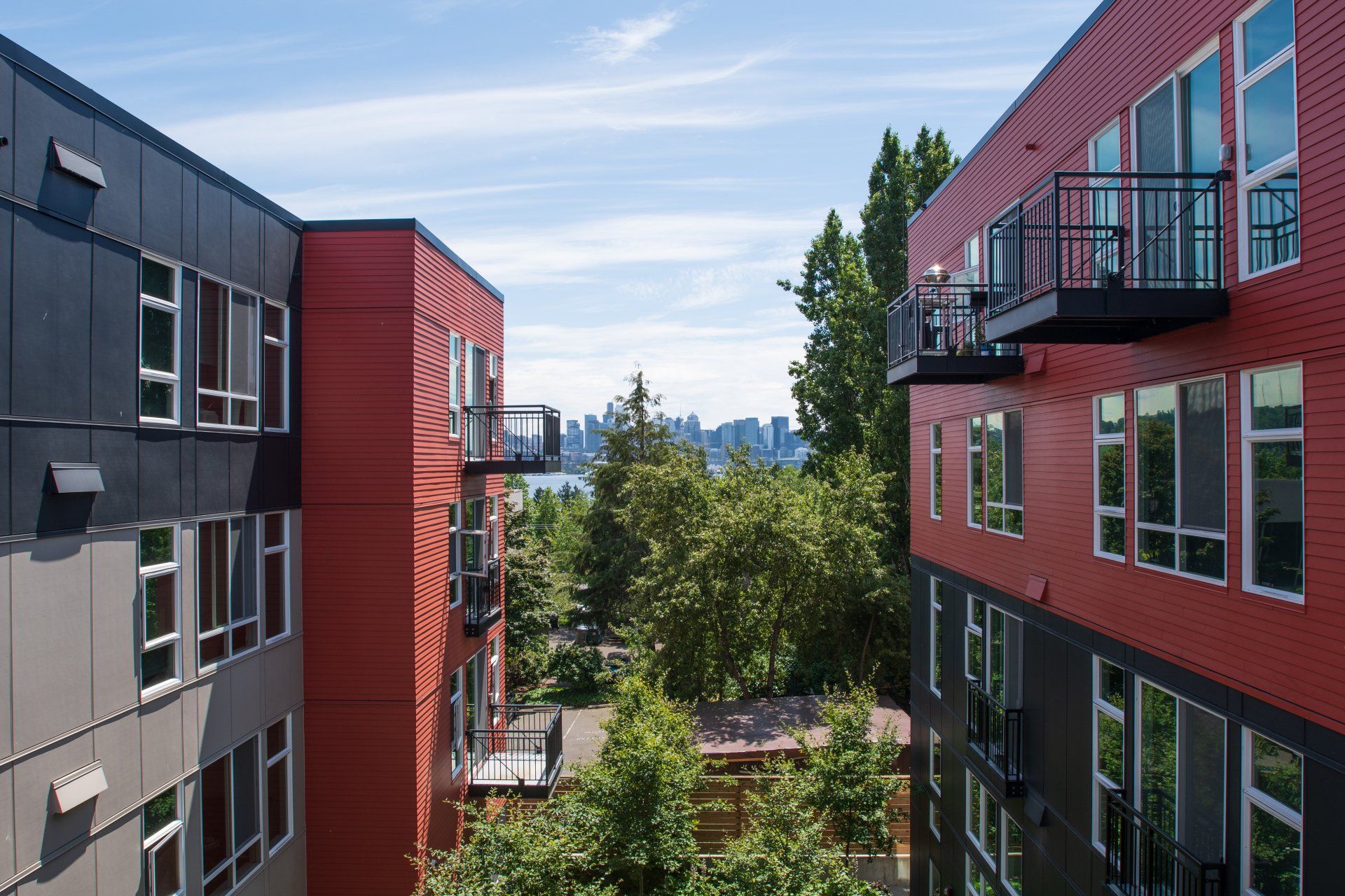 An aerial view of a row of apartment buildings with balconies.