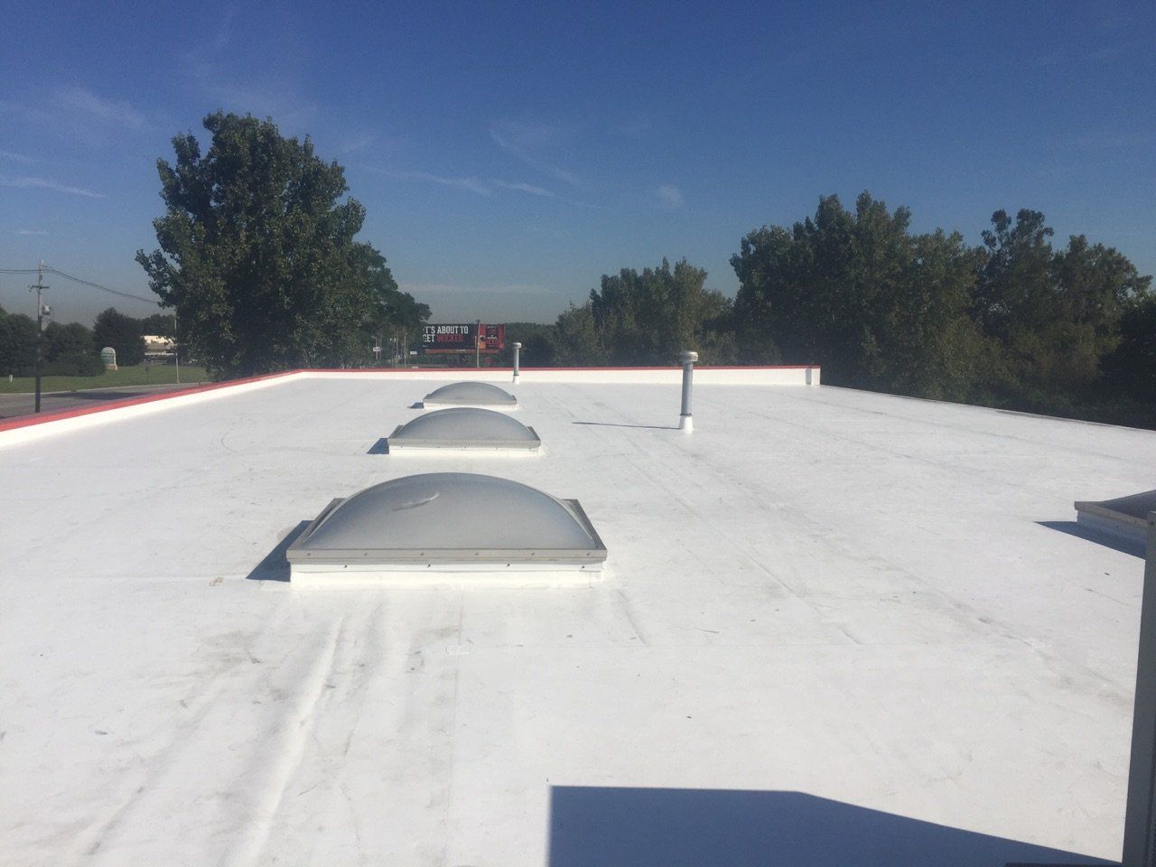 Roofing Companies — Flat Roof Of A Building in Columbus, OH