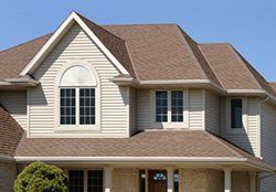 Roofing — Two-Storey House With Shingles in Columbus, OH