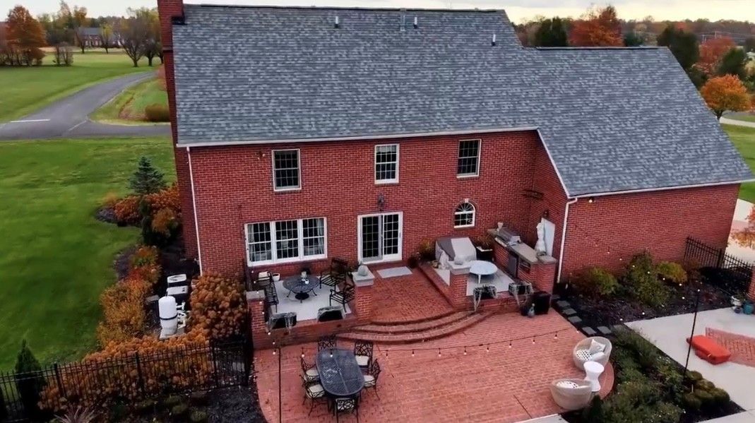Roofers — Luxury House With Brown Roof in Columbus, OH