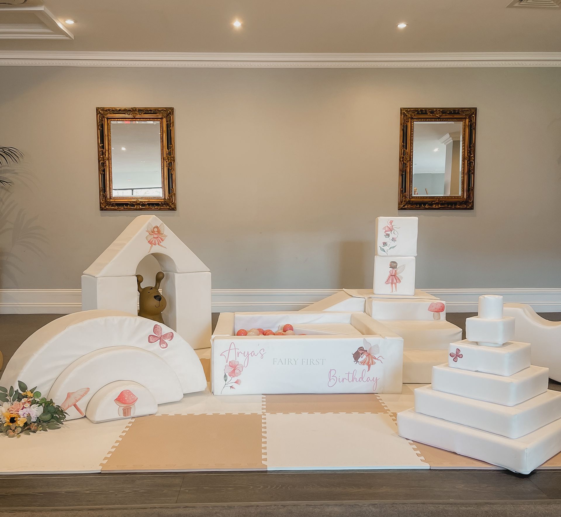 A room filled with lots of white foam blocks and toys