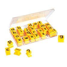 Picture of a box with a stamp for each letter of the alphabet in separate sections of the box